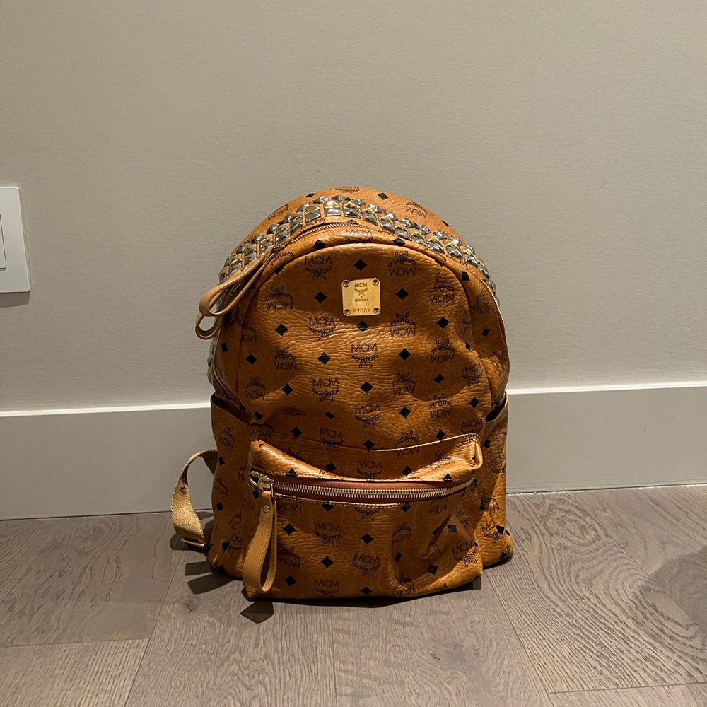MCM backpack with studs on the top with dust bag